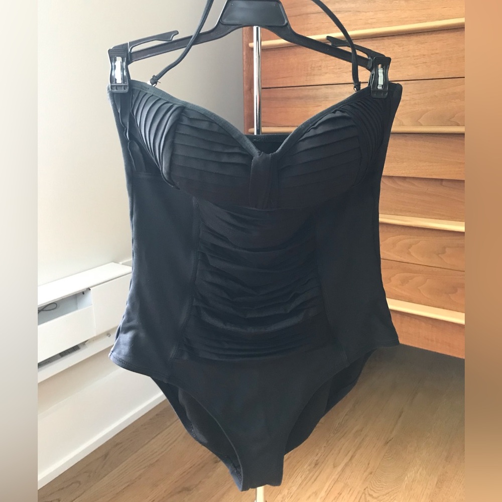 Classic stunning black one piece swimsuit.